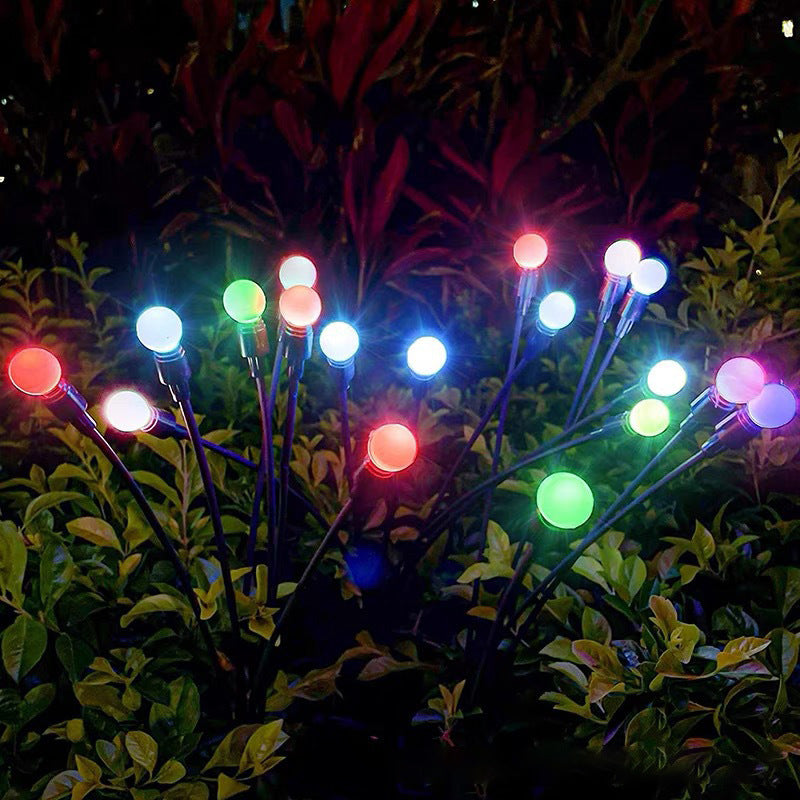Select Society Solar Garden Lights installed in a lush garden, providing ambient warm light for evening enjoyment.