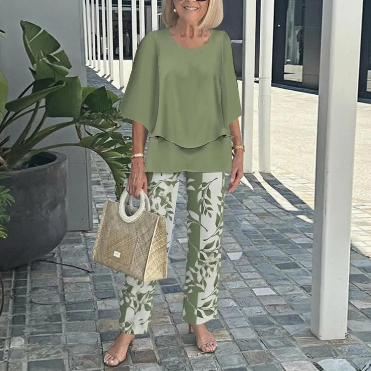Select Society Round-Neck Three-Quarter Sleeve Top, showcasing its elegant fabric texture and relaxed fit.