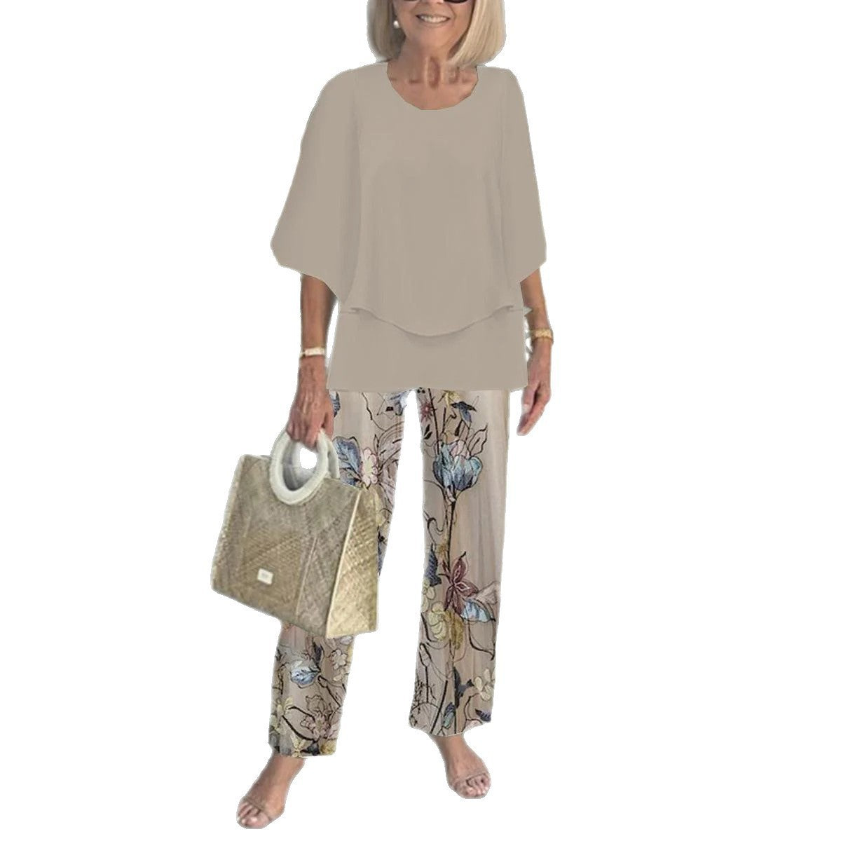 Lifestyle shot of the Select Society Three-Quarter Sleeve Top, worn casually for a sophisticated spring look.