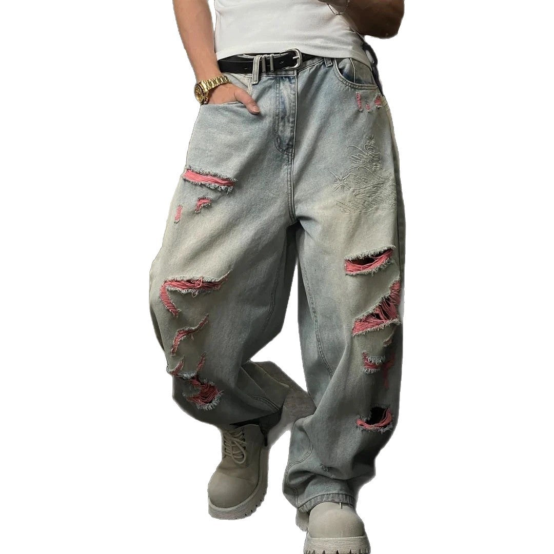 Rear view of Select Society Dragon Embroidered Blue Jeans, emphasizing the cut and overall silhouette for comfort.