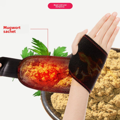 Select Society Electric Heating Wrist Brace worn on a wrist, demonstrating a secure and adjustable fit.