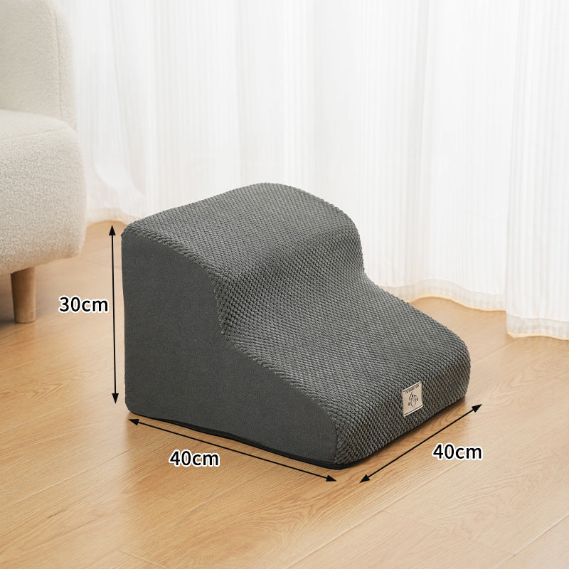 A small dog comfortably using the Select Society Pet Stairs, showing the secure and accessible steps for pets.
