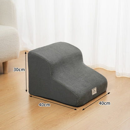 A small dog comfortably using the Select Society Pet Stairs, showing the secure and accessible steps for pets.