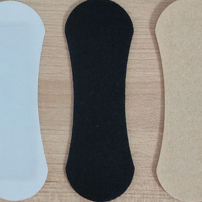 Detail shot of a single Select Society Nasal Strip, emphasizing its breathable material and secure fit.